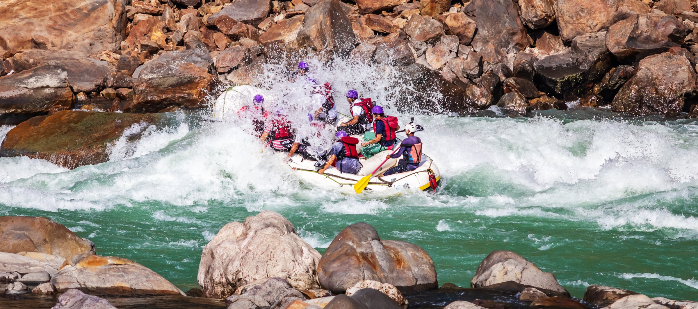 white water rafting with a splash in river ganges rishikesh Indi